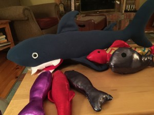 A big shark and dome little fishied